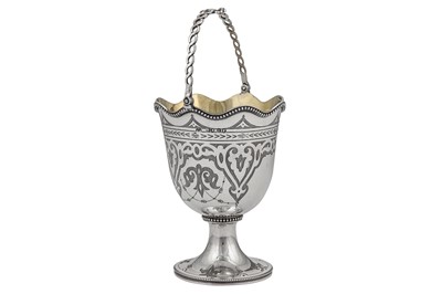 Lot 298 - A Victorian sterling silver sugar basket, London 1867 by Henry Holland