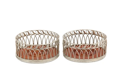 Lot 148 - A pair of late 18th / early 19th century silver wine coasters, possibly Spanish Colonial, Mexican circa 1800
