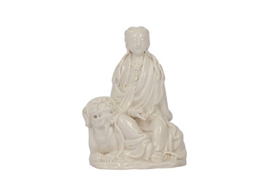 Lot 37 - A CHIENSE BLANC-DE-CHINE FIGURE OF GUANYIN.