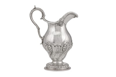 Lot 369 - An unusual George III sterling silver small ewer, London 1762 by John Swift (this mark first reg. 29th June 1739)