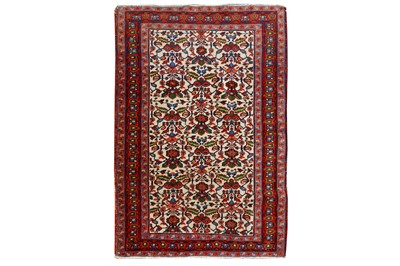 Lot 24 - AN UNUSUAL HERIZ RUG, NORTH-WEST PERSIA