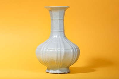 Lot 47 - A CHINESE OCTAGONAL PALE BLUE BOTTLE VASE.