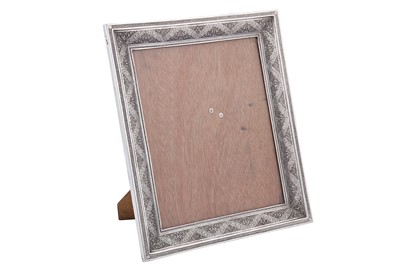 Lot 300 - A mid-20th century Iranian (Persian) silver photograph frame, Isfahan circa 1960 mark of Bagher Parvaresh (c.1910-1978, master 1928)
