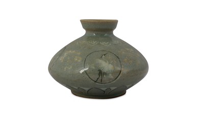 Lot 573 - A KOREAN SANGGAM SLIP-INLAID CELADON 'CRANES' OIL JAR.