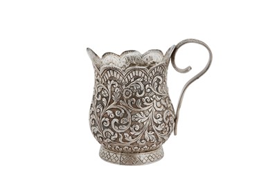 Lot 121 - A late 19th century Anglo – Indian Raj unmarked silver cream jug, Cutch circa 1880-1900