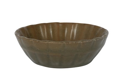 Lot 671 - A SMALL CHINESE CELADON-GLAZED BOWL.