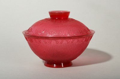 Lot 20 - A CHINESE PEKING GLASS RUBY RED TEA BOWL AND COVER.