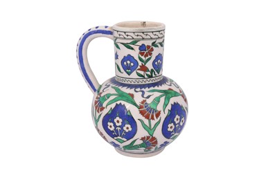 Lot 187 - AN IZNIK-STYLE THEODORE DECK POTTERY JUG