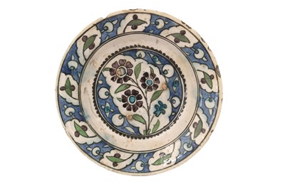 Lot 229 - AN IZNIK-STYLE DAMASCUS POTTERY DISH