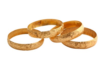 Lot 49 - A collection of four bangles