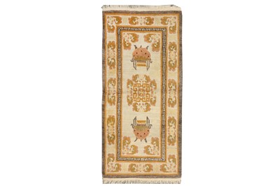 Lot 27 - A FINE TIBETAN RUG