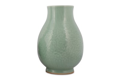 Lot 3 - A CHINESE CELADON-GLAZED 'DRAGON' VASE.