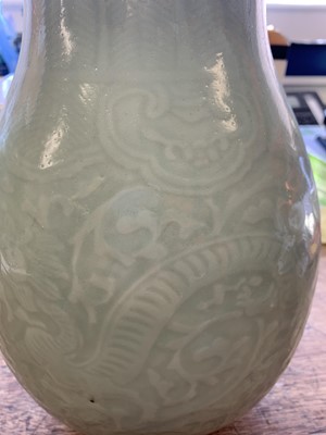 Lot 3 - A CHINESE CELADON-GLAZED 'DRAGON' VASE.