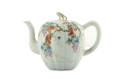 Lot 930 - A CHINESE FAMILLE ROSE 'SQUIRRELS AND VINES' TEAPOT AND COVER.