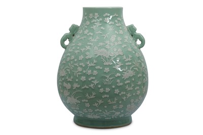 Lot 15 - A LARGE CHINESE SLIP-DECORATED CELADON VASE, HU.