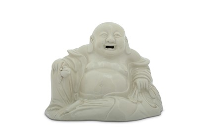 Lot 47 - A CHINESE BLANC-DE-CHINE FIGURE OF BUDAI HESHANG.