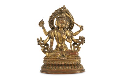 Lot 54 - A GILT-BRONZE FIGURE OF USHNISHAVIJAYA.