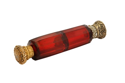 Lot 20 - A late 19th century French unmarked silver gilt double scent bottle, circa 1870