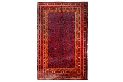 Lot 25 - AN ANTIQUE KHOTAN LARGE RUG, CHINA