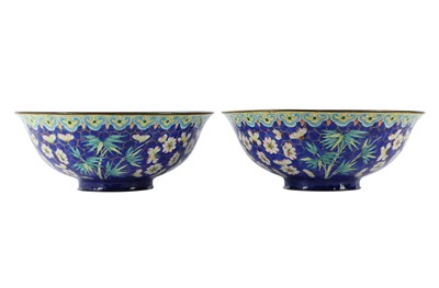 Lot 496 - A PAIR OF CHINESE CANTON ENAMEL 'PRUNUS' BOWLS.