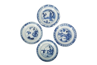 Lot 432 - FOUR CHINESE BLUE AND WHITE 'LADY AND BOY' SAUCERS.