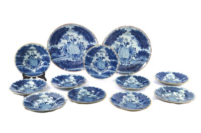 Lot 317 - Ten mid 18th century Delft plates and two chargers in Camaïeu bleu