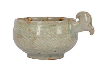 Lot 348 - A SMALL KOREAN CELADON HANDLED BOWL.
