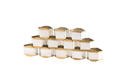 Lot 75 - A set of twelve modern German sterling silver parcel gilt napkin rings, circa 1990 by Robbe & Berking