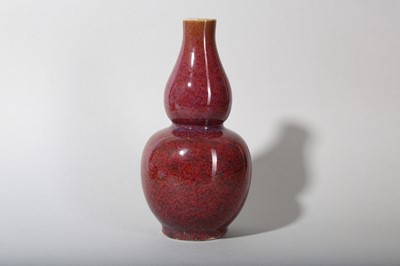 Lot 32 - A CHINESE FLAMBÉ GLAZED DOUBLE GOURD VASE.