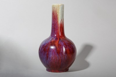 Lot 31 - A CHINESE FLAMBÉ-GLAZED BOTTLE VASE.