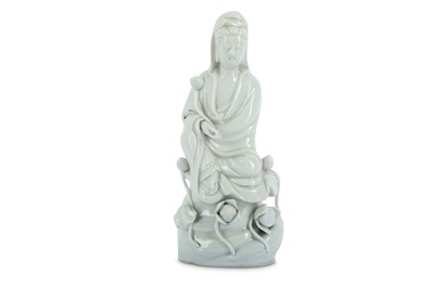 Lot 39 - A CHINESE BLANC-DE-CHINE FIGURE OF GUANYIN.