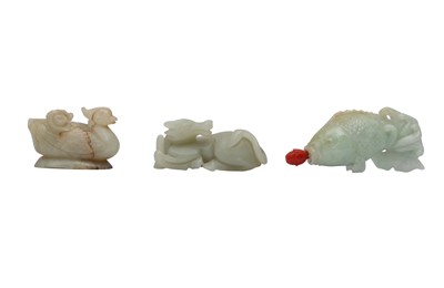 Lot 702 - THREE CHINESE PALE CELADON JADE CARVINGS.