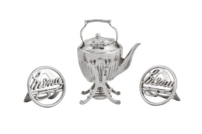 Lot 4 - An Edwardian sterling silver miniature toy tipping kettle on burner stand, Chester 1907 by Saunders and Shepard
