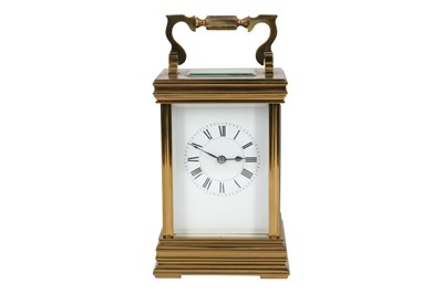 Lot 369 - AMENDED - An early 20th century French lacquered brass carriage clock