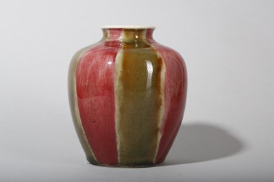 Lot 124 - A CHINESE COPPER RED AND OLIVE GREEN-GLAZED JAR.