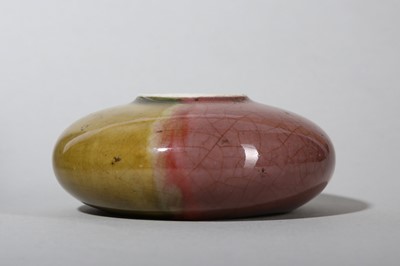 Lot 127 - A CHINESE COPPER RED AND OLIVE GREEN-GLAZED WASHER.
