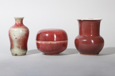 Lot 129 - THREE CHINESE COPPER RED-GLAZED SCHOLAR'S DESK ITEMS.