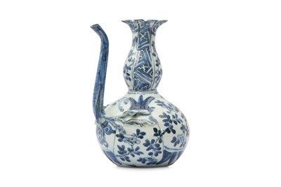 Lot 255 - A CHINESE BLUE AND WHITE 'POMEGRANATE' KENDI.