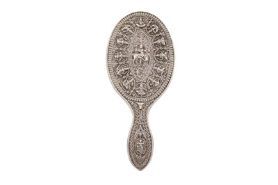 Lot 214 - A SILVER REPOUSSÉ HANDHELD MIRROR