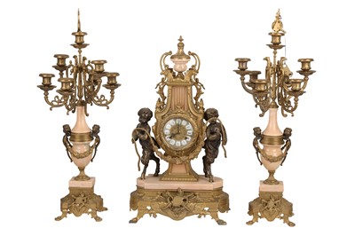 Lot 370 - A mid-20th century Italian gilt brass and oynx mantle clock garntiure, circa 1950