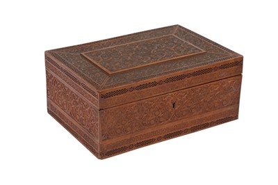Lot 257 - A CARVED FRUITWOOD CASKET