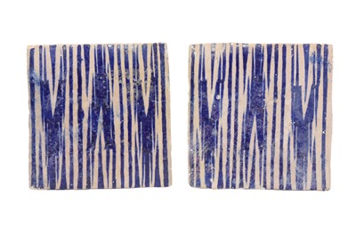 Lot 251 - A PAIR OF IRANIAN POTTERY FLOOR TILES WITH IKAT DESIGN