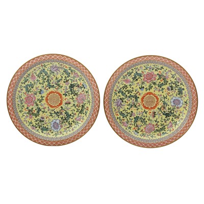 Lot 174 - A pair of Chinese famille-rose yellow-ground dishes, 20th century