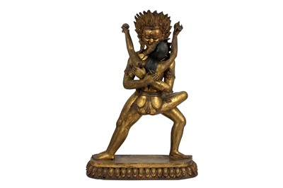 Lot 56 - A TIBETAN GILT-BRONZE FIGURE OF VAJRADHARA AND BHAGVANI.