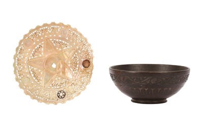 Lot 201 - λ A MOTHER-OF-PEARL OPENWORK PLAQUE AND DEAD SEA STONE BOWL