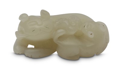 Lot 695 - A CHINESE WHITE JADE 'CATS' CARVING.