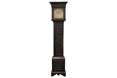 Lot 371 - A late 18th century and later carved oak longcase clock