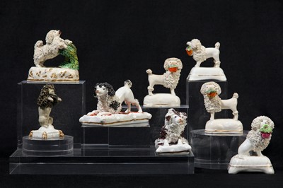 Lot 197 - A pair of Staffordshire porcelain poodles, circa 1820-50