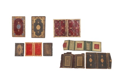 Lot 159 - A GROUP OF EIGHT GILT AND TOOLED LEATHER BOOK BINDINGS