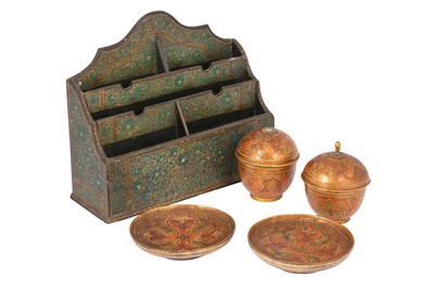 Lot 208 - A KASHMIRI LACQUERED PAPIER-MÂCHÉ DESK ORGANISER AND TWO SUGAR BOWLS WITH SAUCERS